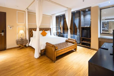 Win Suite hướng thành phố - Miễn phí minibar và trà chiều — Winsuites Saigon Hotel - Complimentary Afternoon Tea & Refreshments